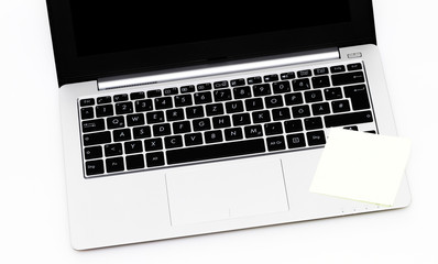 Laptop mit Notizzettel