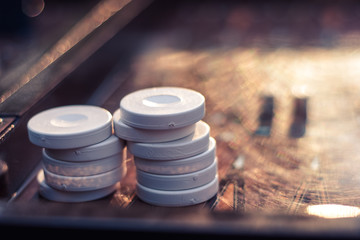 Dices set to play old backgammons.Back gammon table game.Classic table dice game. Rolling dice in...