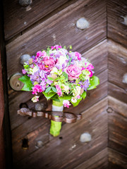 Fototapeta na wymiar The bridal bouquet in the summer at the wedding