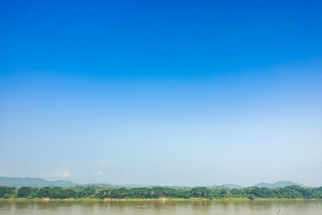 Beautiful scenery and bright sky along the Mekong River between Thailand and Laos.