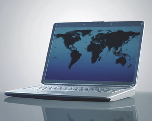 Laptop with a map of the world