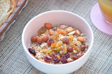 Healthy Breakfast: oatmeal, muesli, dried fruit, fruit juice, crispy bread top view