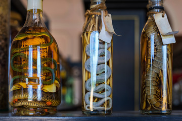 Thai traditional liquor with pickled snakes, cobra, centipede and herb