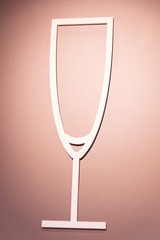 Champagne glass. on the wall in the form of installation. Scheme. Subject.