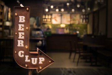 Beer clup title signboard, in front of the store . Retro style