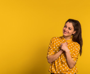 Portrait of a young beautiful woman in studio.