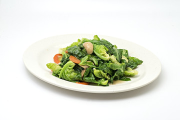 vegetable in white plate isolated on white