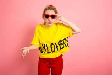 Blonde woman in bright clothes