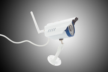 surveillance camera recording on a gradient grey background