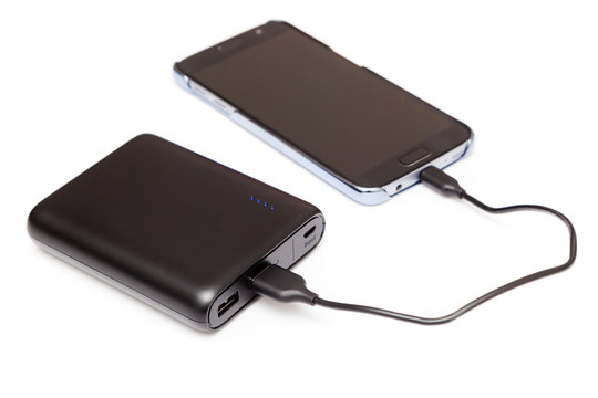 USB Power bank charging smartphone