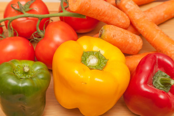 Healthy vegetables - close up of pepper, carrot and tomatoes