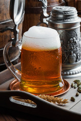 Light beer on an old background