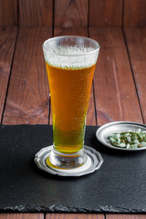 Light beer on an old background