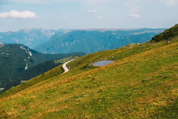 Panoramic view from Monte Baldo with cows and pond