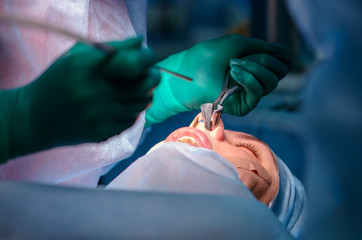 Obraz na płótnie Canvas Plastic surgery of the nose in operating room, rhinoplasty