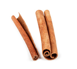 Cinnamon sticks isolated on white background.