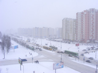 Obraz premium Urban scene after snowfall, snowy road in Minsk, Belarus