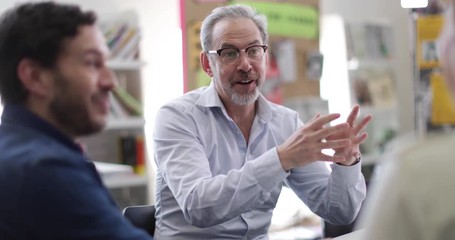 Senior male in a meeting