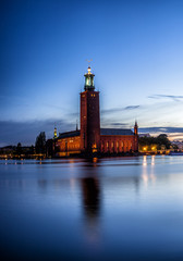 Stockholm sunset with City Hall as seen from Riddarholmen.