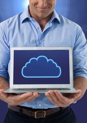 Hands holding laptop with cloud icon