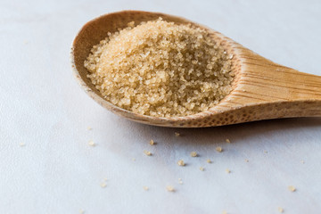 Brown Sugar in Wooden Spoon with Package