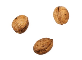 Cracked walnuts isolated on white background, top view