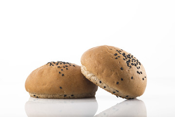 Food:Front View of Whole Wheat Bun Isolated on White Background Shot in Studio
