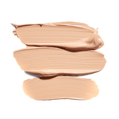 Liquid foundation smudges isolated on white background