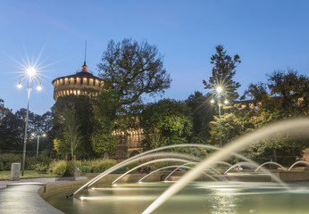 Fountain view of Milan Sforza Castle (Castello Sforzesco) in Milan, Italy