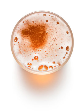 top view of glass of beer isolated on white background