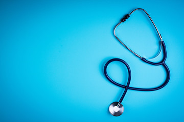 Stethoscope on blue background. Medical background. Doctor equipment. Medicine, medical...