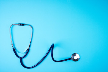Stethoscope on blue background. Medical background. Doctor equipment. Medicine, medical...