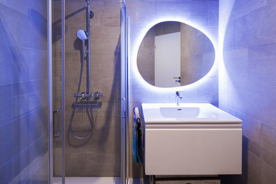 Modern Marble Bathroom With Backlit Mirror