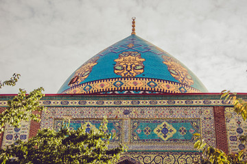 Blue mosque cupola close up. Elegant islamic masjid building. Travel to Armenia, Caucasus. Touristic architecture landmark. Sightseeing in Yerevan. City tour. Tourism industry. Religious concept