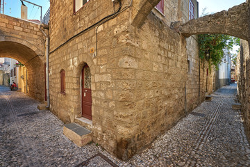 Crossway of two narrow streets in the old Rhodes city