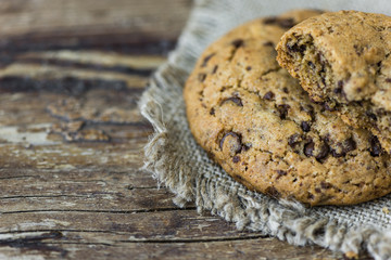 Freshly Baked Chocolate Cookies on a Burlap. Sweet Biscuits. Homemade pastry. Copy Space