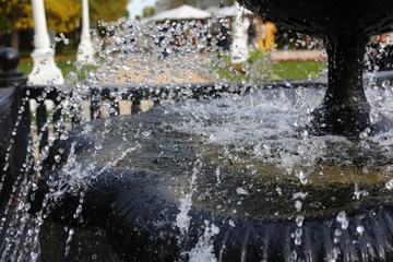 Peaceful scenery with fountain in regent's park of Moscow