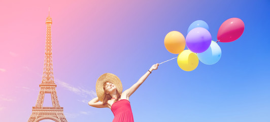 girl with colorful balloons and Eiffel tower