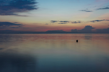Beautiful sunrise on a calm beach in Bali
