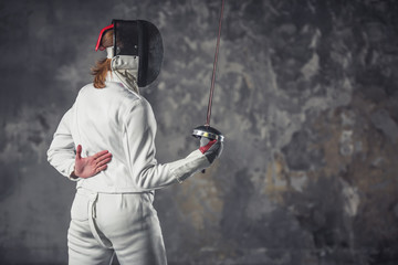 Woman is fencing