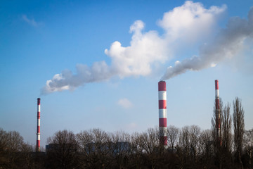 The power station with three smoke stacks air pollution view
