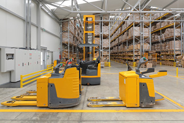 Electric Pallet Truck in Warehouse © markobe