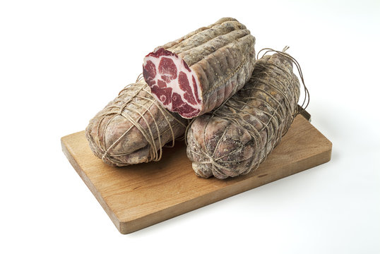 Cutting board with salami air-cured pork meat coppa