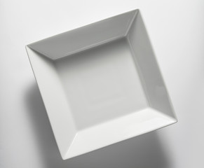 Top view of empty white square plate