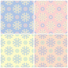 Set of faded colored seamless backgrounds with floral patterns