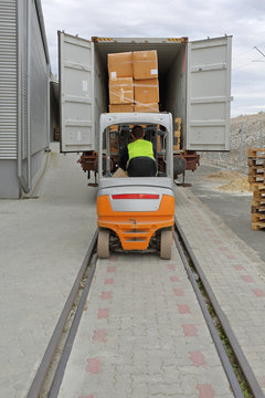 Forklift Loading Cargo Train