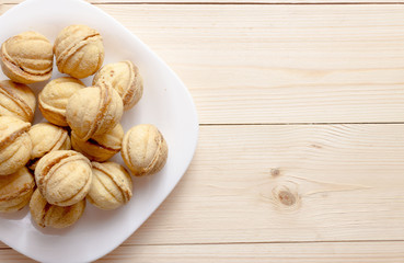 Walnuts cookies with boiled condenced milk top view copy space