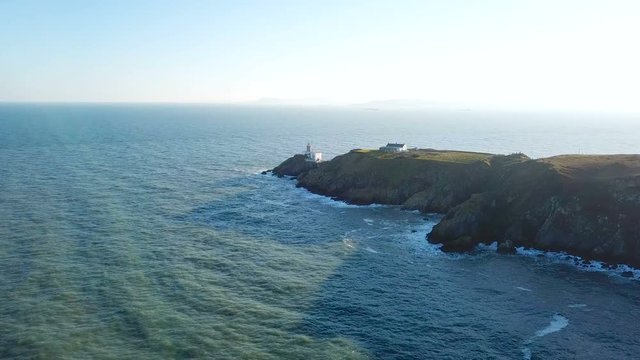 aerial view of beautiful lighthouse on a cliff in Howth, Ireland
