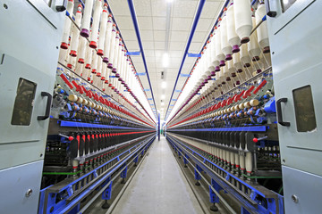 The modern spinning machine works in the workshop