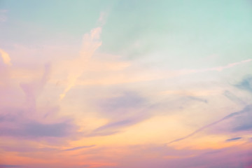 pastel colored cloudy sky - orange, purple, blue, and white